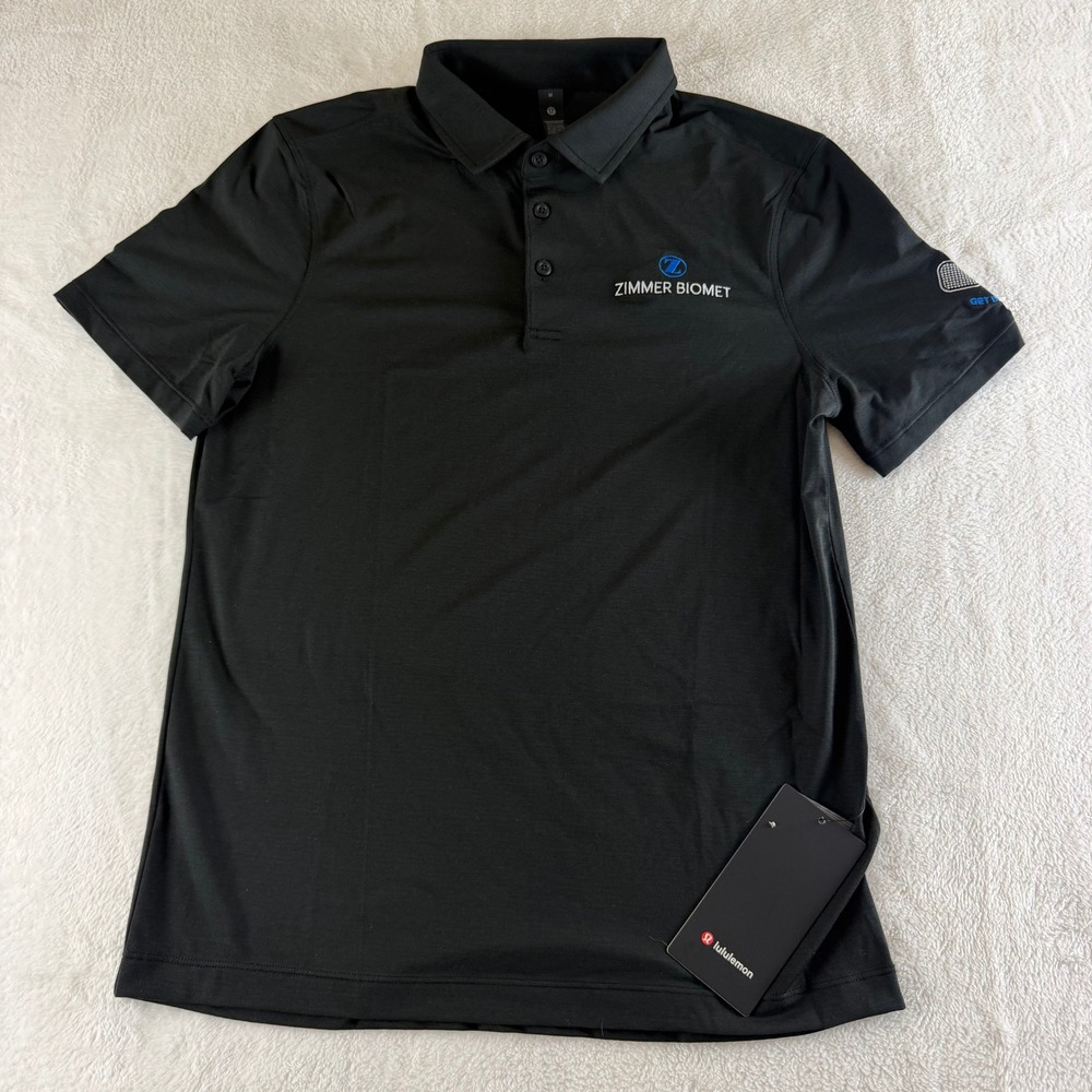 Lululemon Evolution Polo Shirt Mens Medium Black Zimmer Biomet Sporty Logo NWT